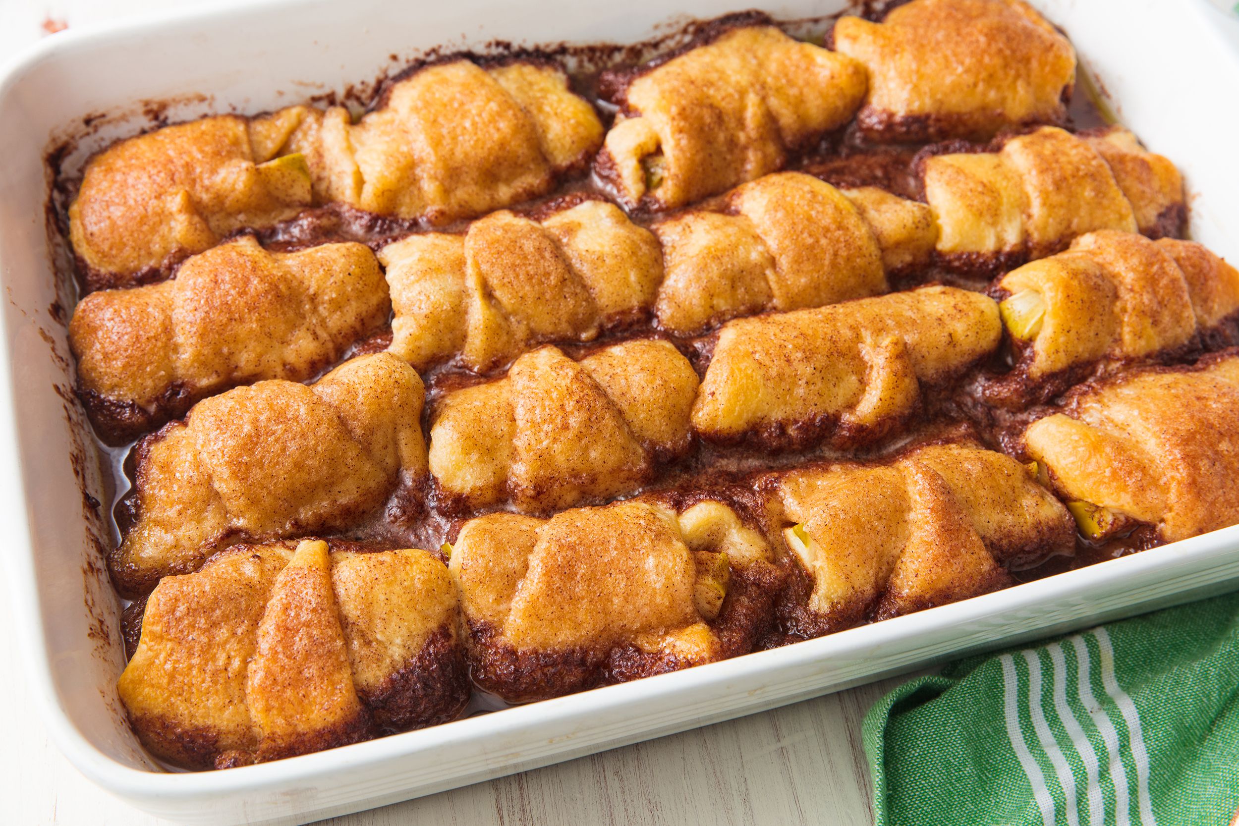 a tray of apple dumplings food