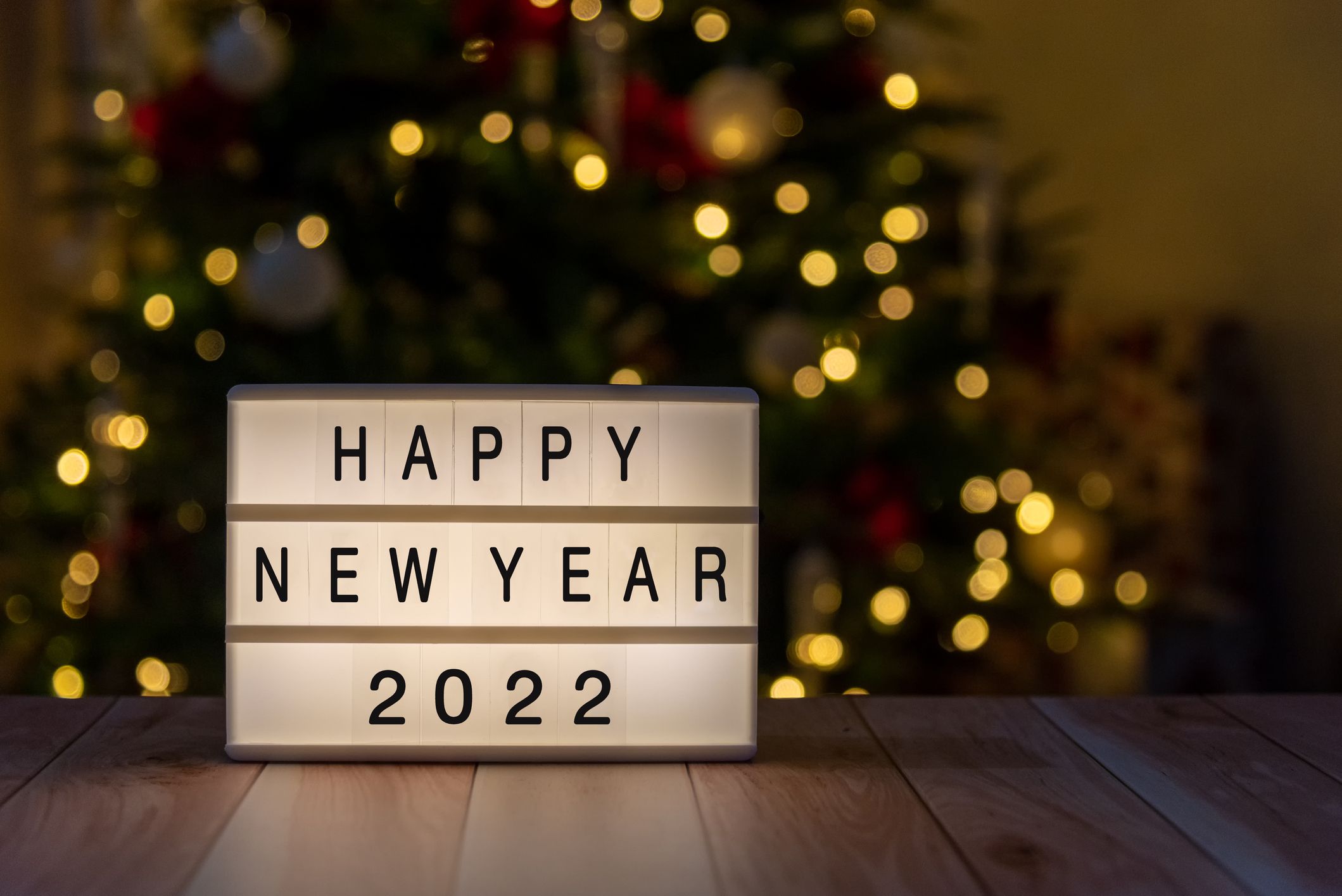 a sign with text that reads happy new year 2022
